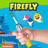 Child holding Firefly Sea N' Sound Baby Shark Toothbrush