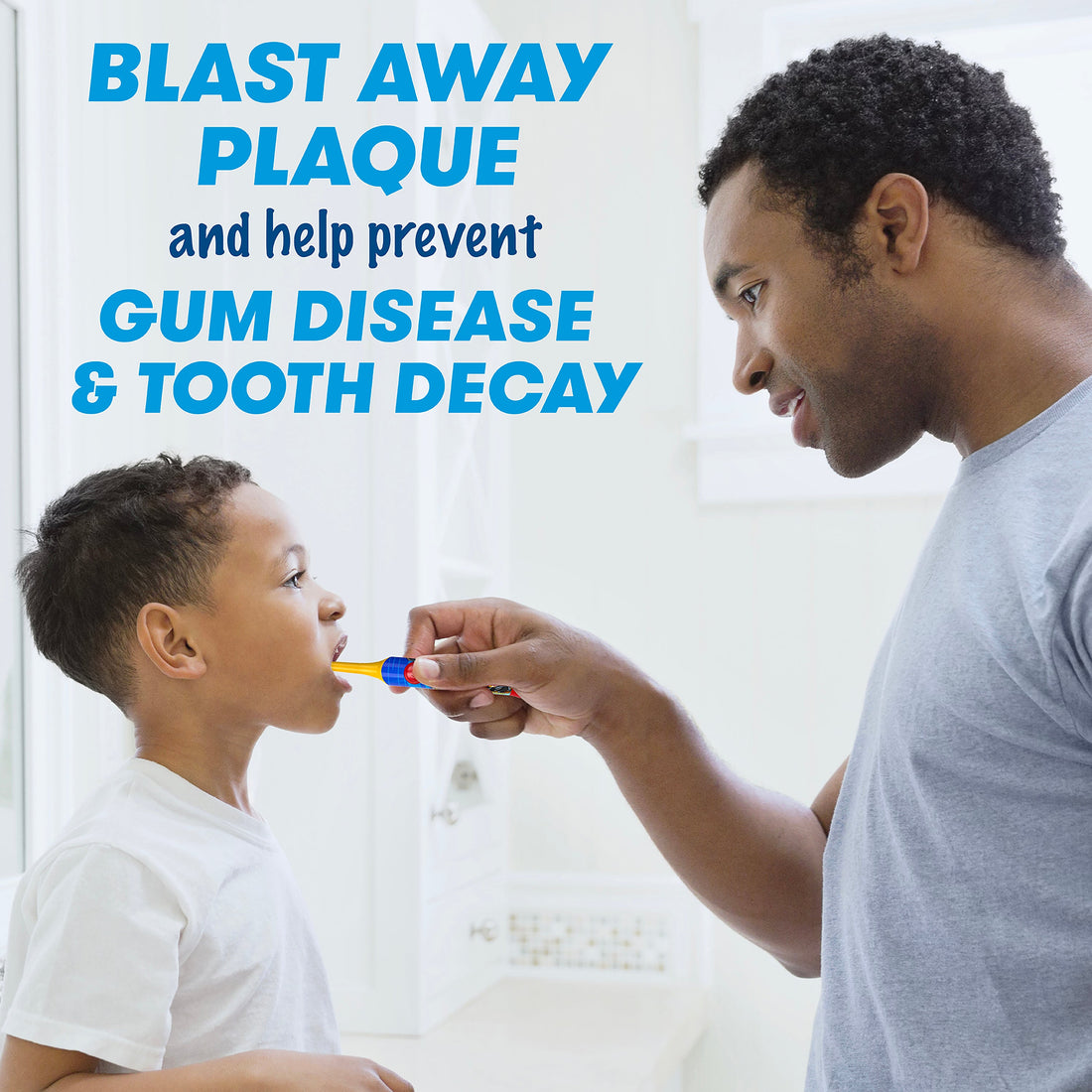 Father brushing the teeth of his son with a Clean N&