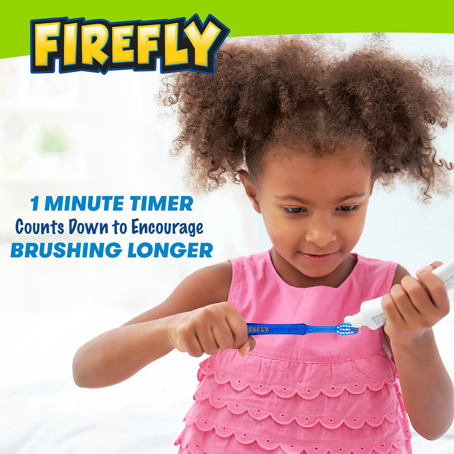 Child adding toothpaste to Light Up Toothbrush, 1 minute timer counts down to encourage brushing longer