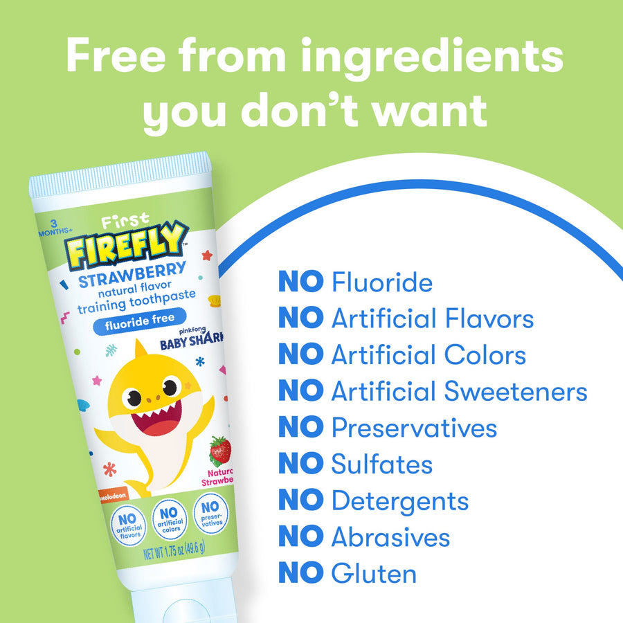 Tube of First Firefly Baby Shark Natural Strawberry Flavor Training Toothpaste, Free from ingredients you don't want, No Fluoride, No Artificial Flavors, No Artificial Colors, No Artificial Sweeteners, No Preservatives, No Sulfates, No Detergents, No Abrasives, No Gluten