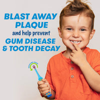 Boy holding Clean N' Protect Toothbrush. Blast away plaque and help prevent gum disease and tooth decay