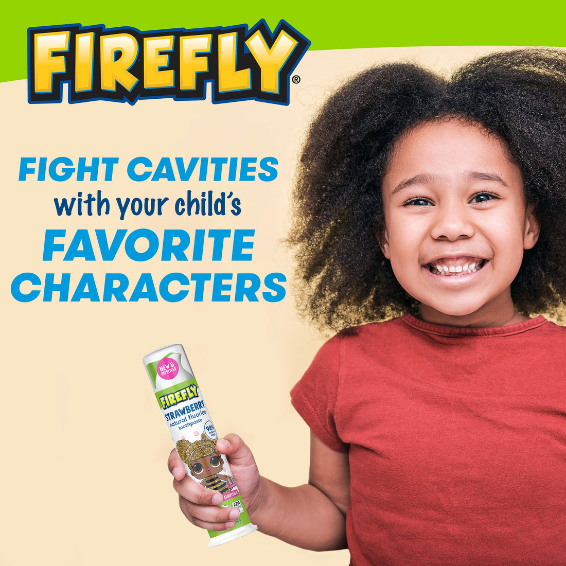 Child holding Firefly Kids L.O.L. Surprise! Anti-Cavity Natural Fluoride Toothpaste, Strawberry Flavor, Fight cavities with your child&